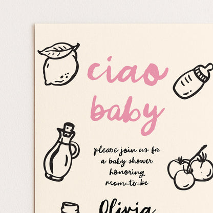 The image is a baby shower invitation featuring a pink and black color scheme with various baby-related items such as a bottle, a lemon, and tomatoes.