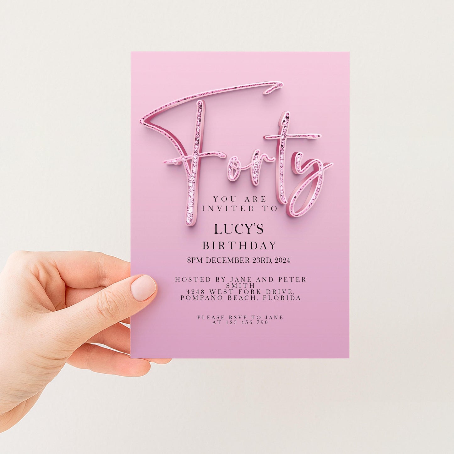 A pink birthday invitation card with the text "You are invited to LUCY'S BIRTHDAY" and details about the event.