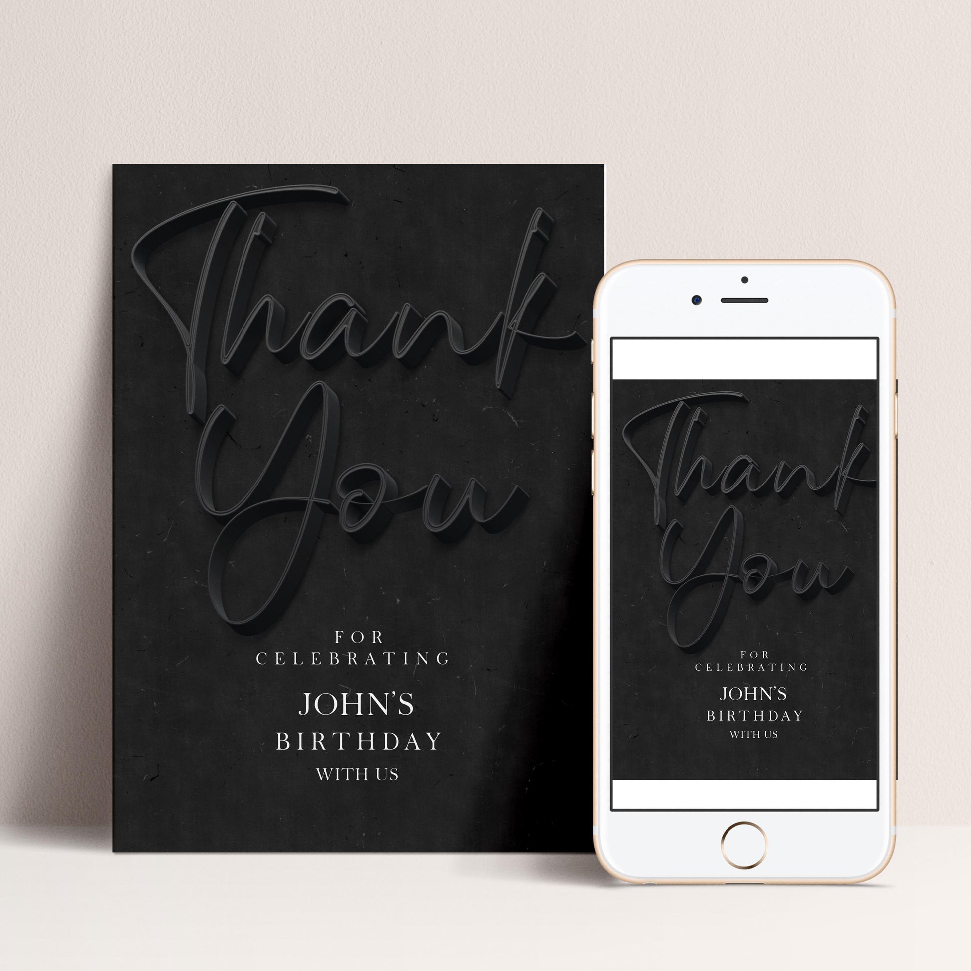 a black card with the text "Thank You" and a smaller card with the same text on it, both placed next to a white smartphone.
