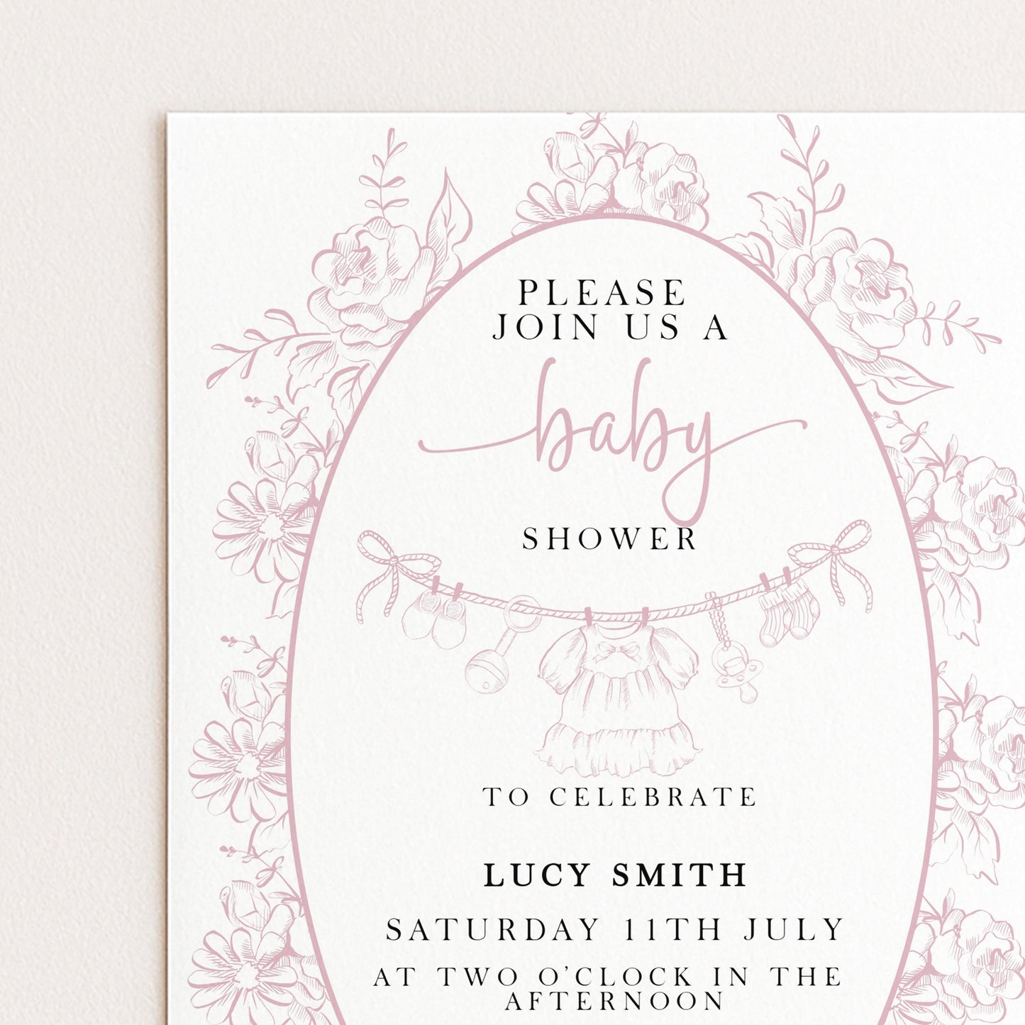 The image is a pink and white baby shower invitation featuring a floral border and text inviting guests to a baby shower celebration.