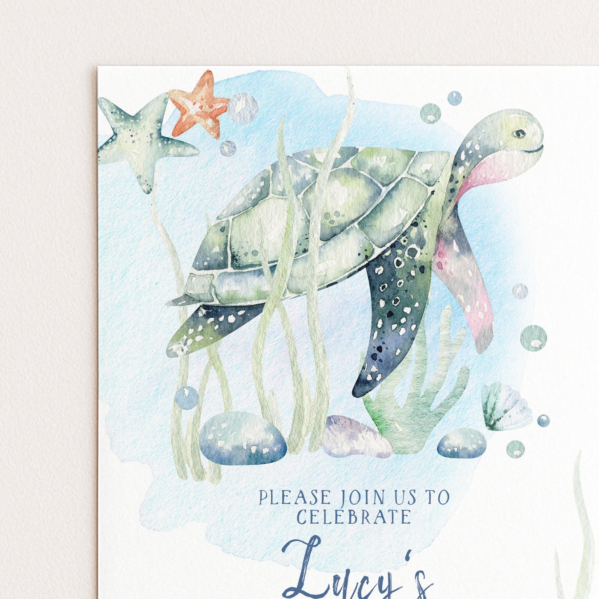 The image is a watercolor painting of a sea turtle surrounded by various marine life, including a starfish and bubbles, with a message inviting people to "Join us to celebrate" and the name "Lucy's" below.