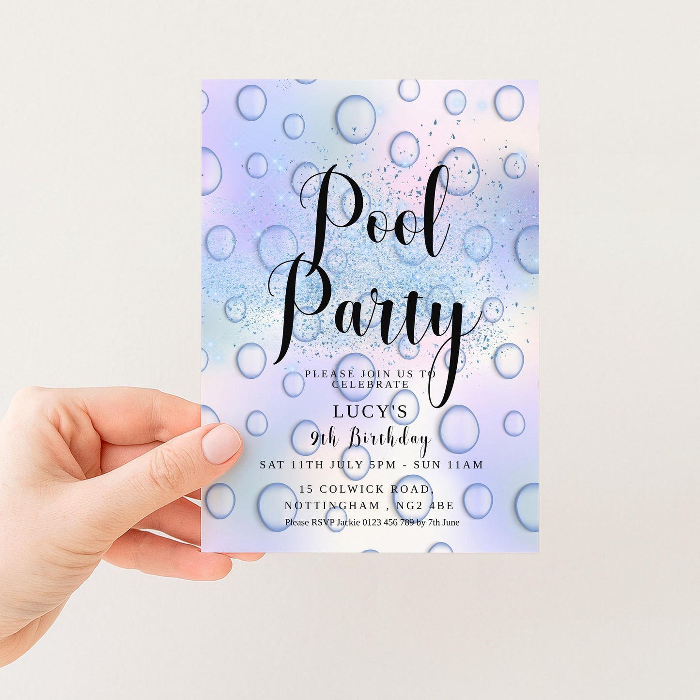 The image is a hand holding a colorful invitation card for a pool party.