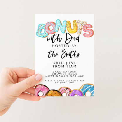 The image is a colorful invitation card with the word "Donuts" written in large letters, surrounded by various donut illustrations. The card is being held by a person's hand, and it appears to be a party invitation or event related to donuts.