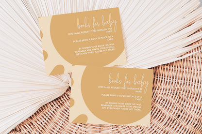 Two beige cards with text on them, placed on a woven surface.