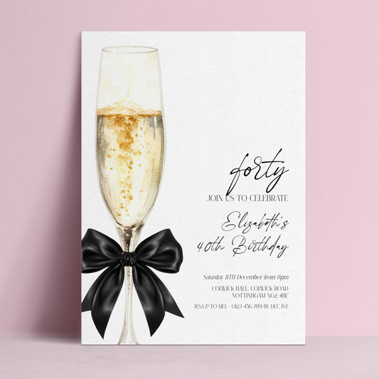 The image is a birthday invitation for a 40th celebration, featuring a champagne glass with a black ribbon and the text "Join us to celebrate Elizabeth's 40th birthday".
