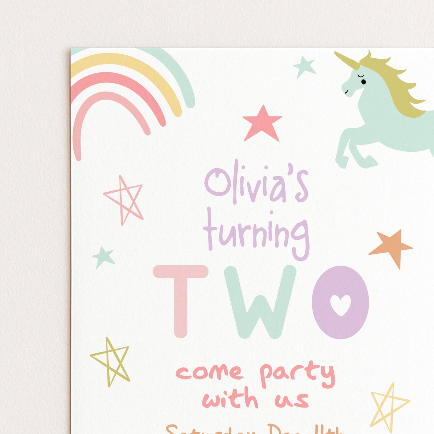 The image is a birthday party invitation for a child named Olivia, featuring a unicorn, stars, and the text "Olivia's turning two" along with the phrase "come party with us" and the date "Saturday, April 8th".