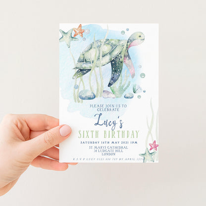 The image is a birthday invitation for a child named Lucy, featuring a turtle and starfish design.