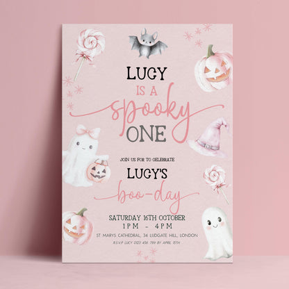 Editable pink spooky one 1st birthday invitation with cute Halloween ghosts pumpkins and boo-day typography on dusty pink background — digital download template via Corjl