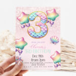 Mermaid 3rd birthday invitation for girl with pastel rainbow balloons, number 3, cupcake, and shell decorations