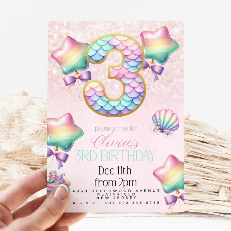 Mermaid 3rd birthday invitation for girl with pastel rainbow balloons, number 3, cupcake, and shell decorations