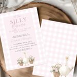 Pink gingham baby shower invitation featuring a smiling goose with floral baskets, shown on wood background with matching back design.