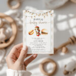 Editable Baby-Q baby shower invitation template with watercolor hot dog, burger, and kebab under string lights