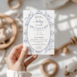 Blue Toile Baby Shower Invitation Template held in hand