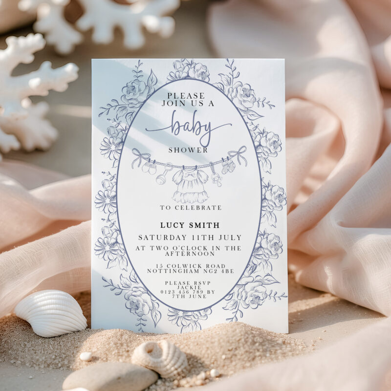 Blue Toile Baby Shower Invitation on beach with shells