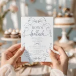Bows and Brunch baby shower invitation in blue toile with ribbon design, editable in Corjl.