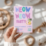 Cat themed kids birthday invitation card in hand
