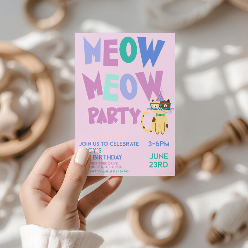 Cat themed kids birthday invitation card in hand